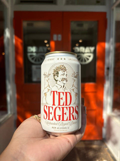 Ted Segers can outside of the doors at Dray